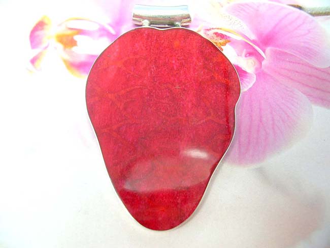 High quality jewelry exchange outlet distributes bali Artist inspired abstract heart design pendant with 925. sterling silver frame and coral gem