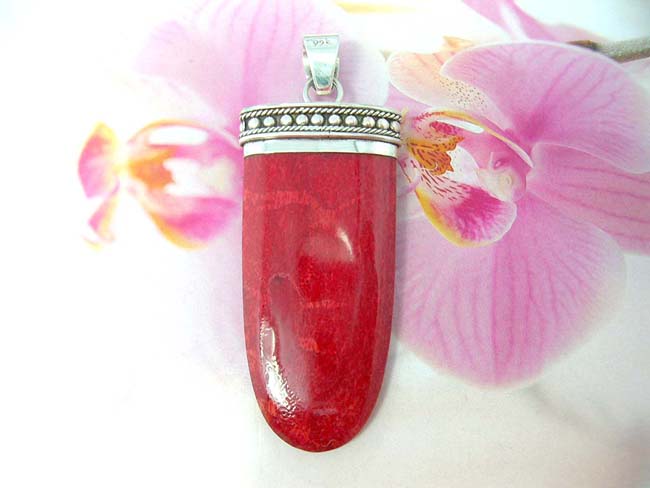Premier bali wear accessory shopping warehouse, Crafted coral pendant in bullet design with 925. sterling silver mounting decorated with bead design