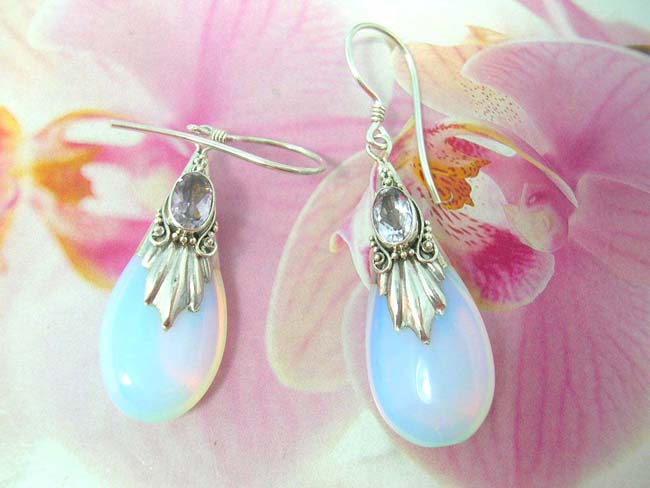 Online gift wear importer supplies Artisan inspired bali earrings with opalescent gem held by 925. sterling silver mounting embedded with imitation diamond