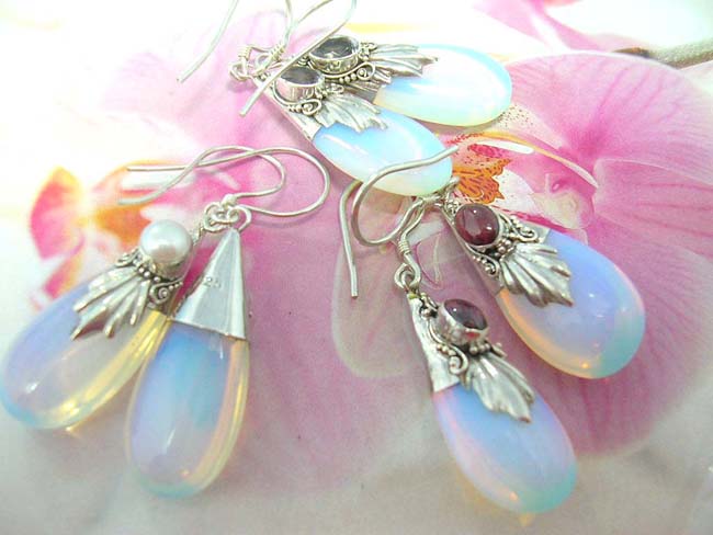Import wholesaler distributes bali made Unique opalescent gemstone earrings with 925. sterling silver frame with decorative design and trendy crystal