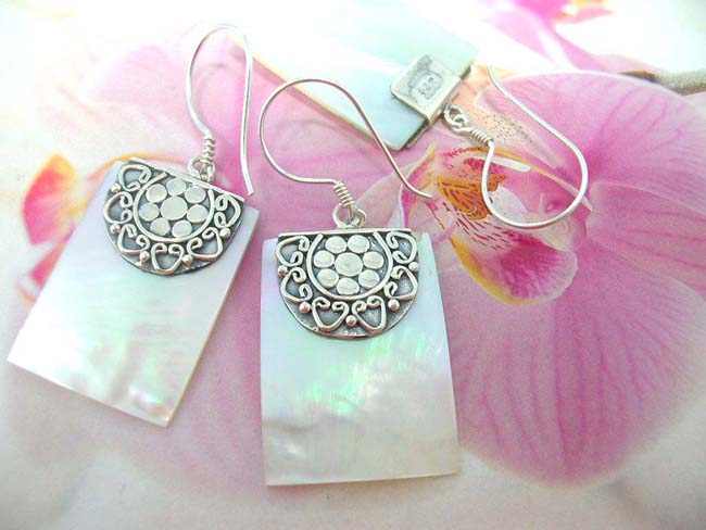 Indonesian art wear boutique dealer supplies Floral and heart designed 925. sterling silver mounted earrings with opalescent gems