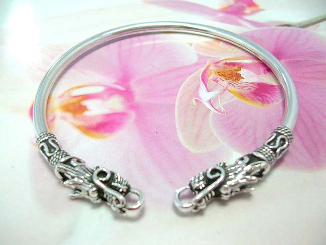 Bali contemporary art wear b2b trader, Asian dragon designed clasps on stylish 925. sterling silver bangle bracelet with coil and snake decor