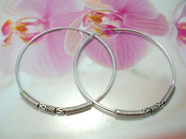 Shop indonesian art jewelry online, Unique snake designed coil between twisted band on 925. sterling silver hoop earrings