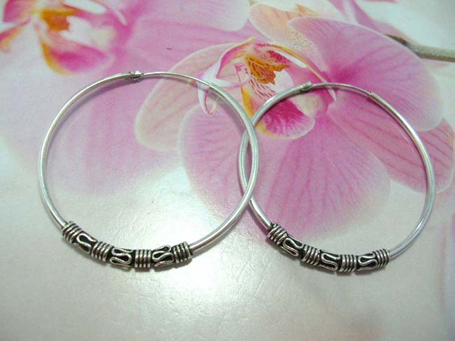 Wholesale accessory outlet supplier, Bali designer wear hoop earrings with four coil and snaky design, made from 925. sterling silver