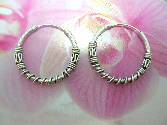 TRendy wholesale accessories online, Handcrafted sterling silver hoop earrings with wrap around cord design and snake style motif