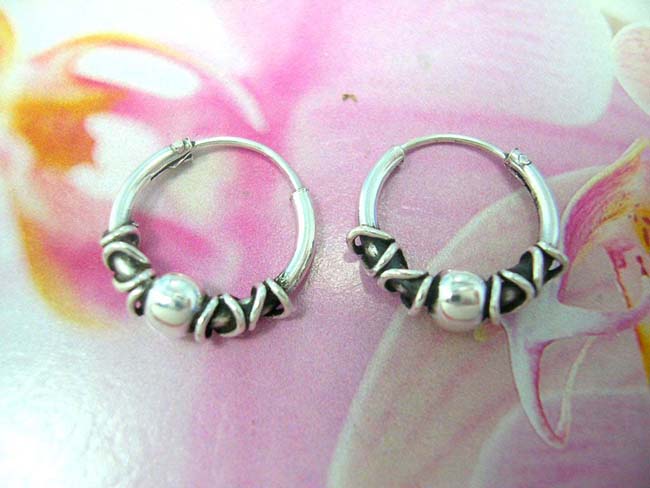 Free online jewelry catalog, 925. sterling silver ball bead framed by coiled poles on miniature hoop earrings