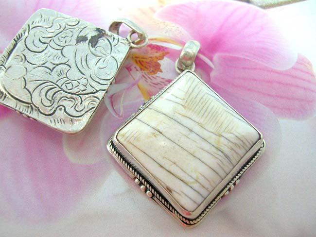 Modern jewelry boutique, Diamond designed white gemstone pendant with decorative 925. sterling silver frame