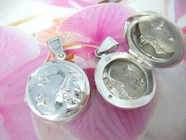 Fashion jewelry retail wholesaler, Celestial design etched into 925. sterling silver circular locket pendant