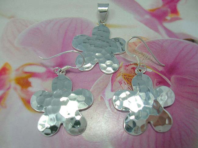 Bali bali artisan jewelry set in daisy motif, crafted from 925. sterling silver, ladies jewelry shop online