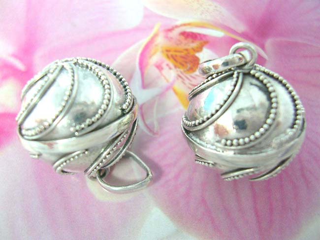 New age jewelry supply retailer. 925. Sterling silver bead and pole design in spiral motif on beautiful bali ball pendant 
