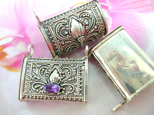 Shop wholesale indonesian jewelry. Vintage pendant in 925. sterling silver purse theme with amethyst gem on unique beaded flower design  