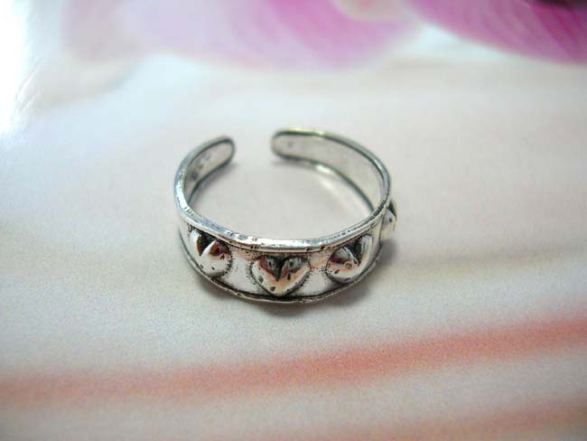 Party accessory supply outlet. New age valentines toering with heart theme on 925. sterling silver band