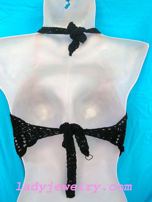 Balinese beachwear fashion shopping catalog. Party wear bali top in embroidered black knit with stylish seashell crest 