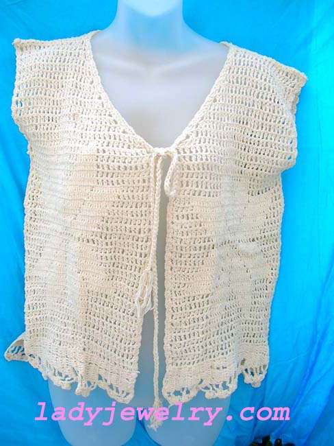 Summer aloha fashion gift store. Ladies high style sleeveless crochet cardigan handcrafted from white thread that ties up at top 