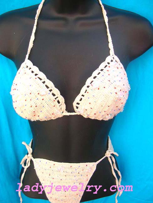 Fashion resort style online shop. Flirty beach bikini from handcrafted crochet knit and stylish bead and sequin flower design 