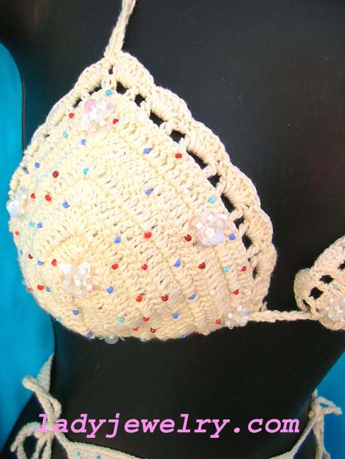 Fashion resort style online shop. Flirty beach bikini from handcrafted crochet knit and stylish bead and sequin flower design 