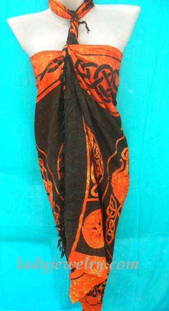 Fashion beach accessories online shopping. Celtic art designed bali sarong in orange and black  