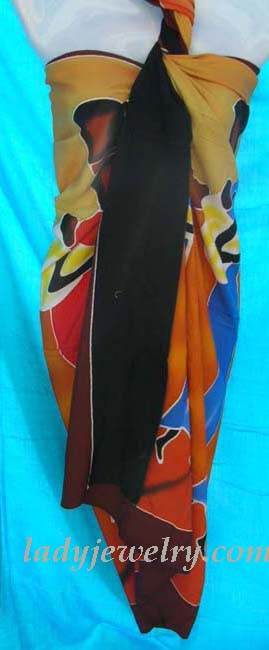 Handcrafted beach wear art shopping. African portrait design tribal print on stylish beach shawl 