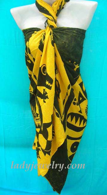 Swimwear import retailer supplies Bright yellow and black shawl wrap with contemporary tribal art design 