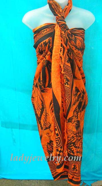 Beach swim wear gift shopping. Urban summer wrap skirt in orange and black with hip fashion print 