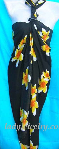 Tropical casual wear supply catalog. Artisan wear beach wrap in black with yellow floral design  