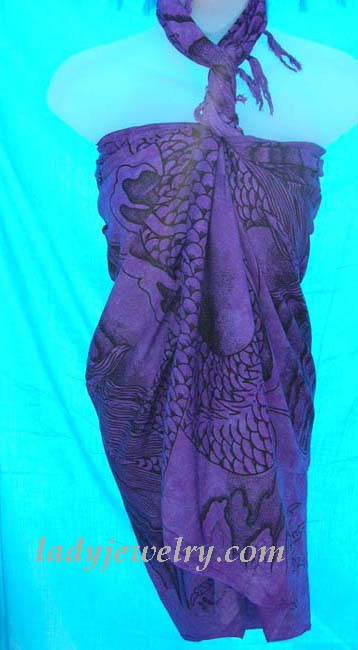 Premier resort apparel boutique retailer. Contemporary artist inspired print on purple leisure summer sarong 