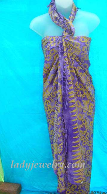 Hawaiian island resort wear supplier. Yellow spring flower pattern on purple beach sarong dress  