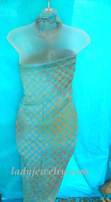 High style summer apparel fashion retailer. Silver spiral adorned, aqua blue beach sarong 