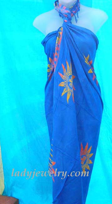 Sky design tropical attire accessories online. Blue indonesia summer sarong skirt with yellow and red sun pattern 