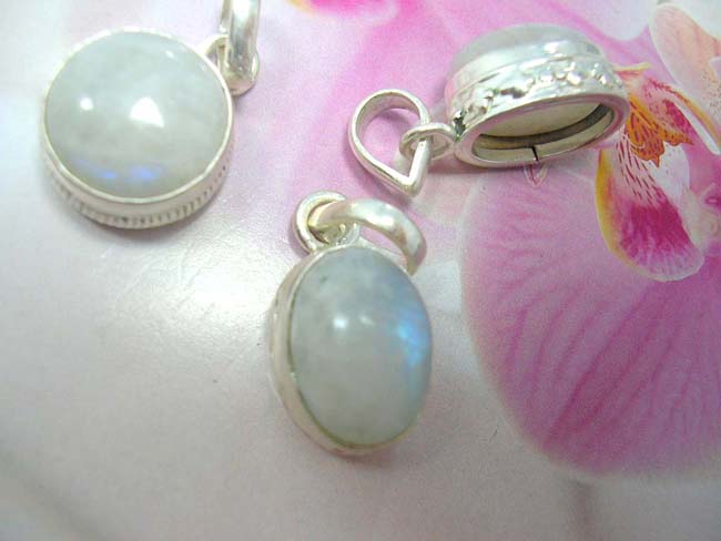 Bali jewelry warehouse express, Unique indonesian made, 9250 sterling                silver pendant with precious stone center