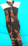 Glamour beach wear gift store. Hawaiian flower print design in orange on ladies beach batik scarf