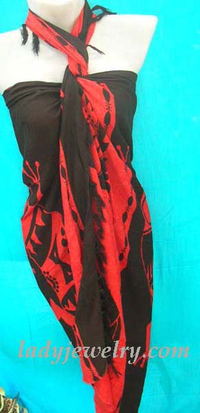 Sexy swimsuit accessory outlet. Handcrafted balinese fashion sarong in black with red tribal art design 